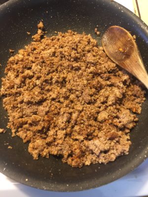 Cooked ground beef.
