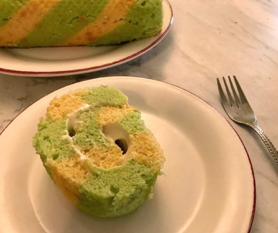 This St Patricks Day Zebra Roll cake is the perfect festive food for you to serve for dessert. With easy to follow instructions and an even easier recipe, you'll have the luck of the Irish on your side as you serve this cake. Click for your recipe. #StPatricksDay #zebrarollcake #recipe #cooking #green