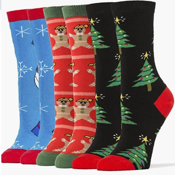 Gingerbread Christmas socks in a 3-pack with snowmen and trees.