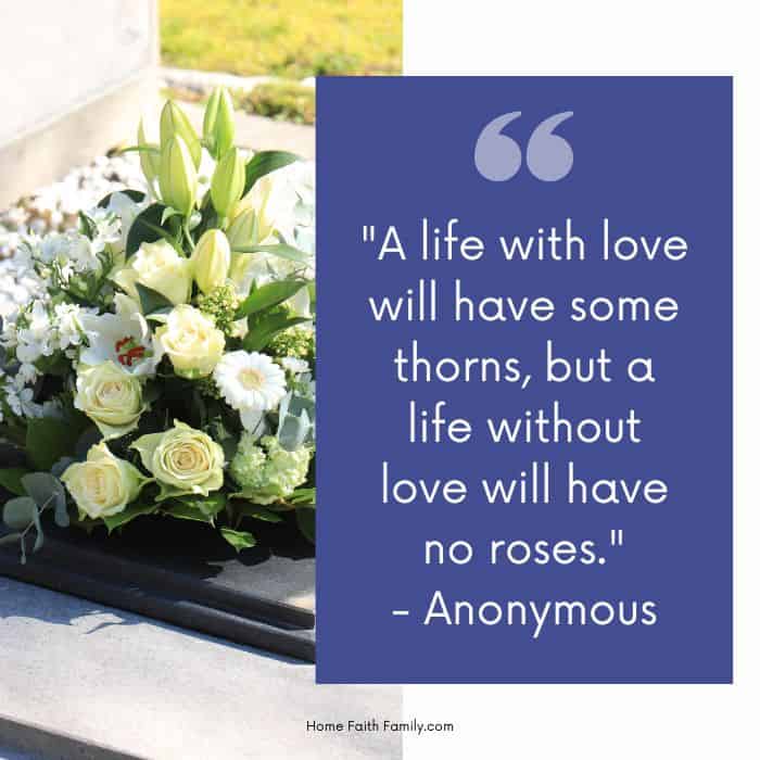 An elegant floral arrangement beside an inspiring memorial quote: "a life with love will have some thorns, but a life without love will have no roses." - anonymous.