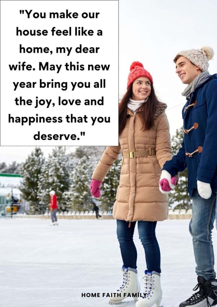 A couple are ice skating and holding hands together.