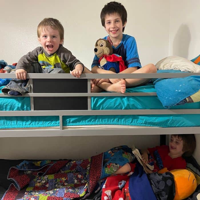 Three brothers getting ready to go to sleep. Bedtime routine for stay at home moms.