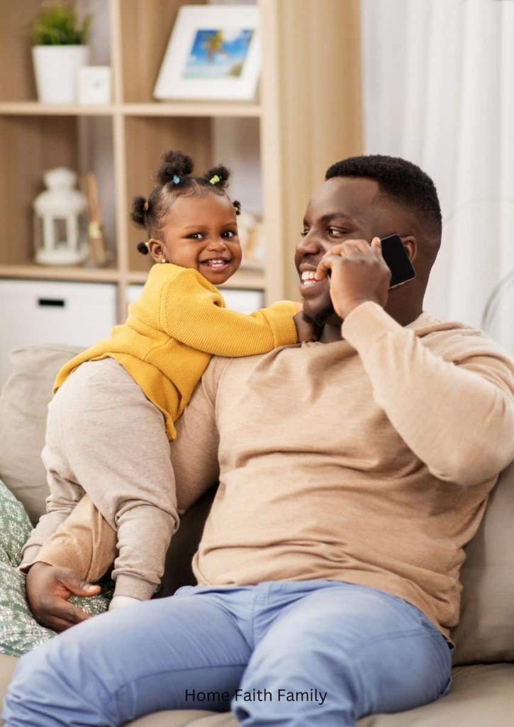 Man on the phone with his daughter.