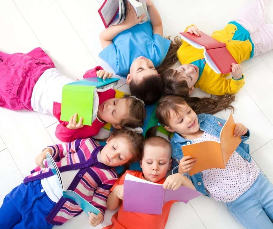 a group of second graders reading chapter books.