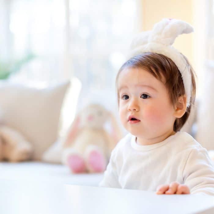 1 year old baby with bunny ears.