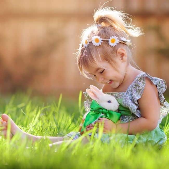 easter story for kids, girl holding bunny rabbit.