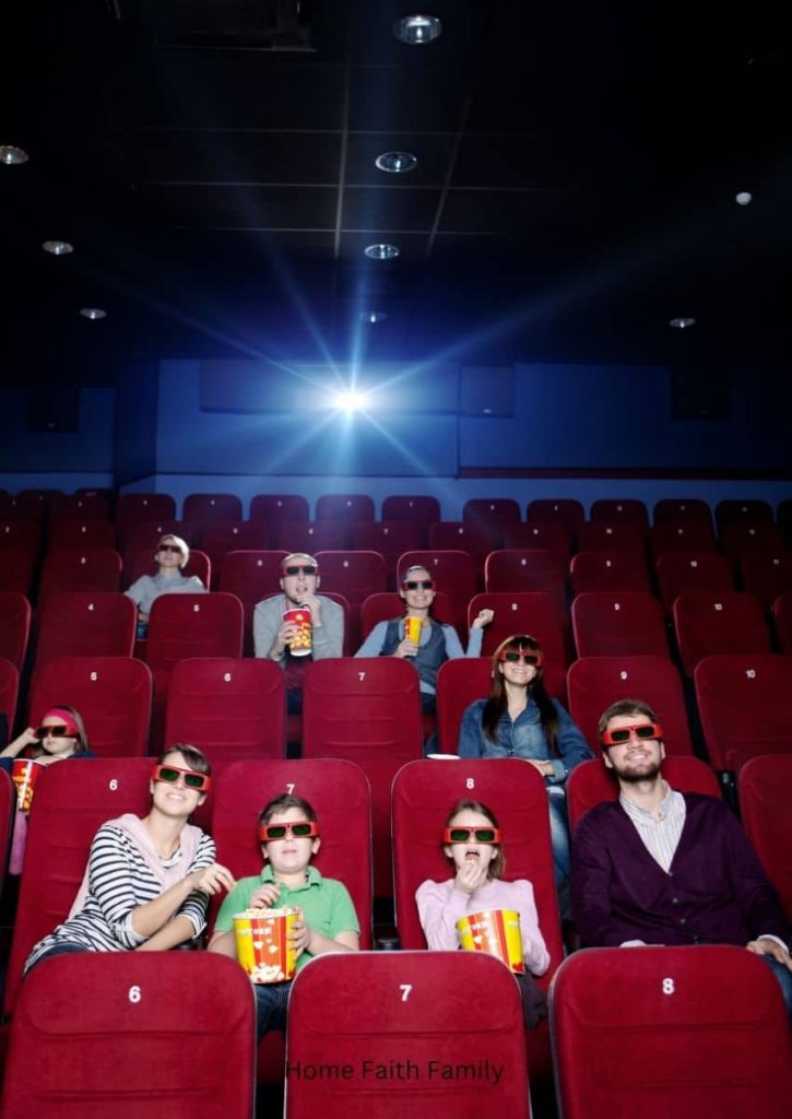 An audience watching a movie in the theater.