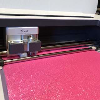 Pink glitter craft paper.