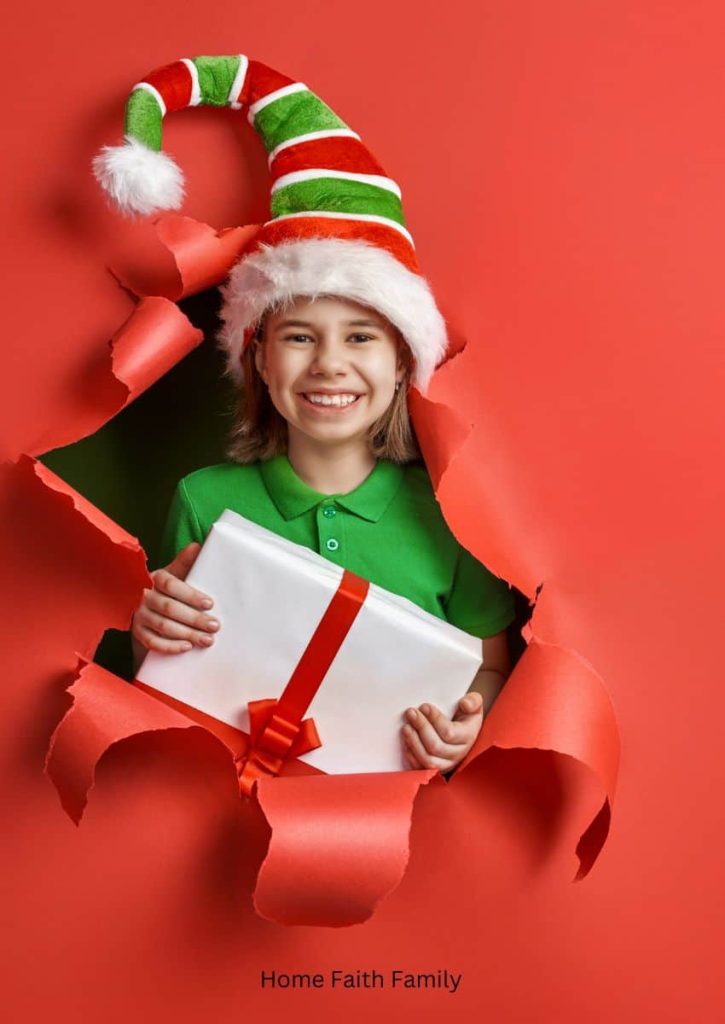 A child wearing an elf hat with a Christmas present popping out of red paper.
