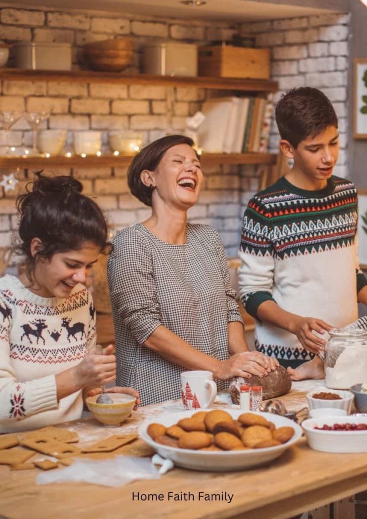 A mother with her son and her daughter in the kitchen laughing and baking.