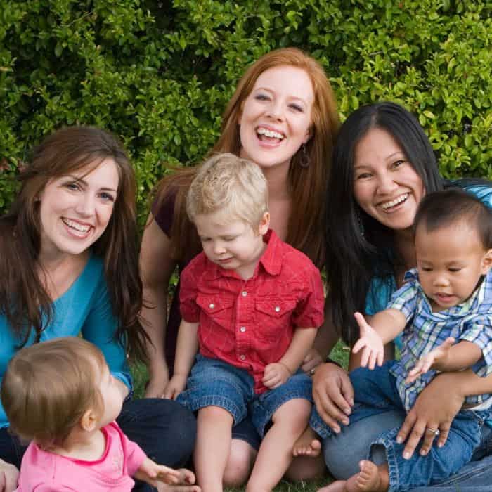 A group of moms spending time with each other and their children.