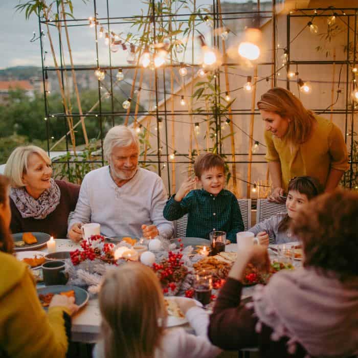 A family gathered around a table for Thanksgiving dinner.