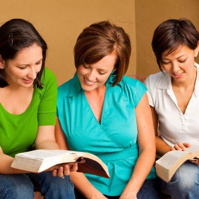 Women in the bible studying.